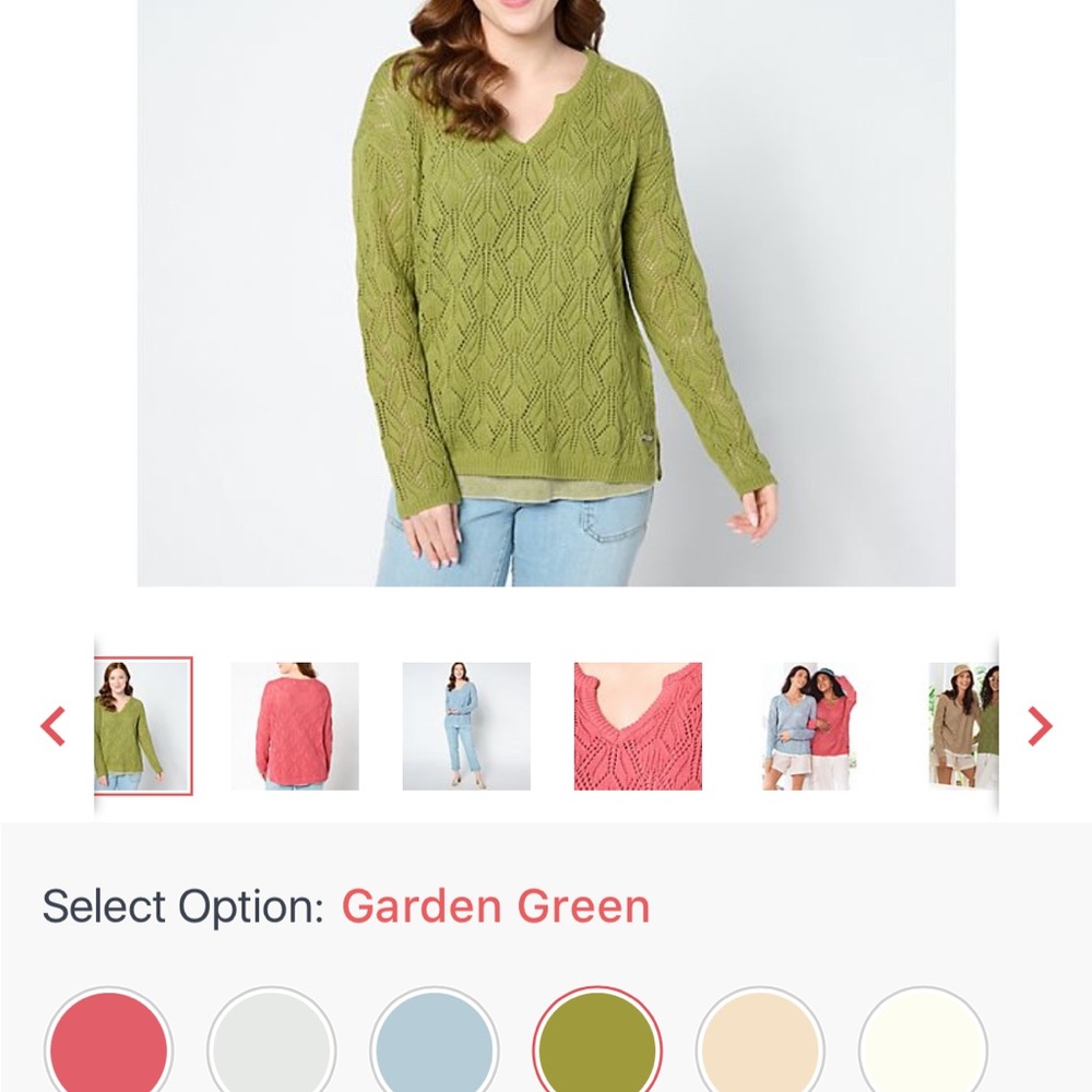 Peace love world. Green sweater.